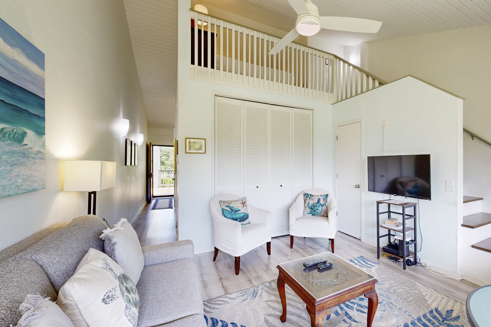 Kahuku Vacation Rentals, Kuilima Estates West #132 - Cozy lofted layout overlooking the living room.