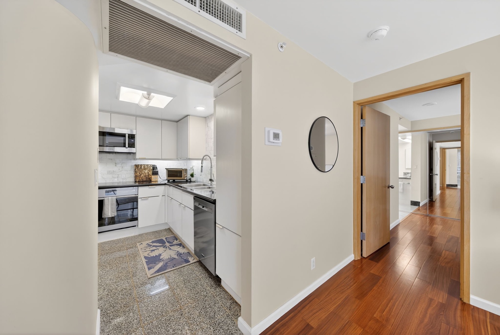 Honolulu Vacation Rentals, Island View at Waikiki Landmark - Enter into a bright open layout with a full kitchen just steps from the living area.