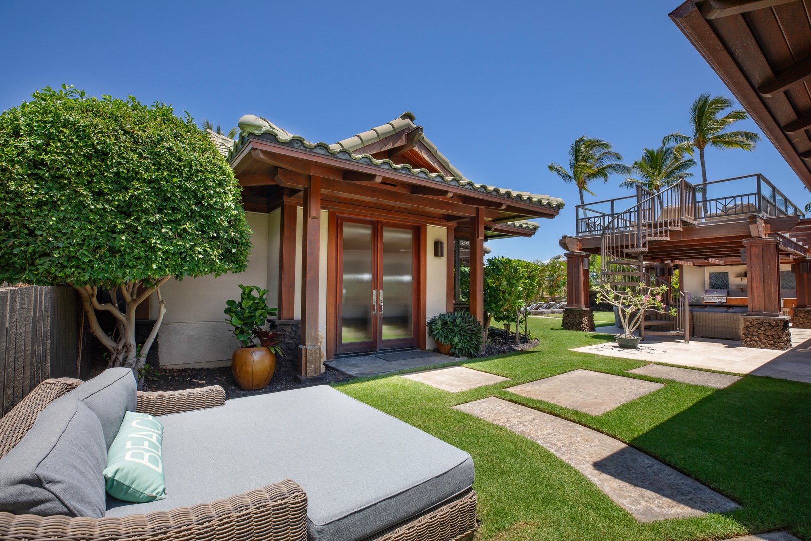 Kamuela Vacation Rentals, Canoe House & Beach Walker at Champion Ridge - Traditional island architecture welcomes you with beauty, shade, and space to unwind.