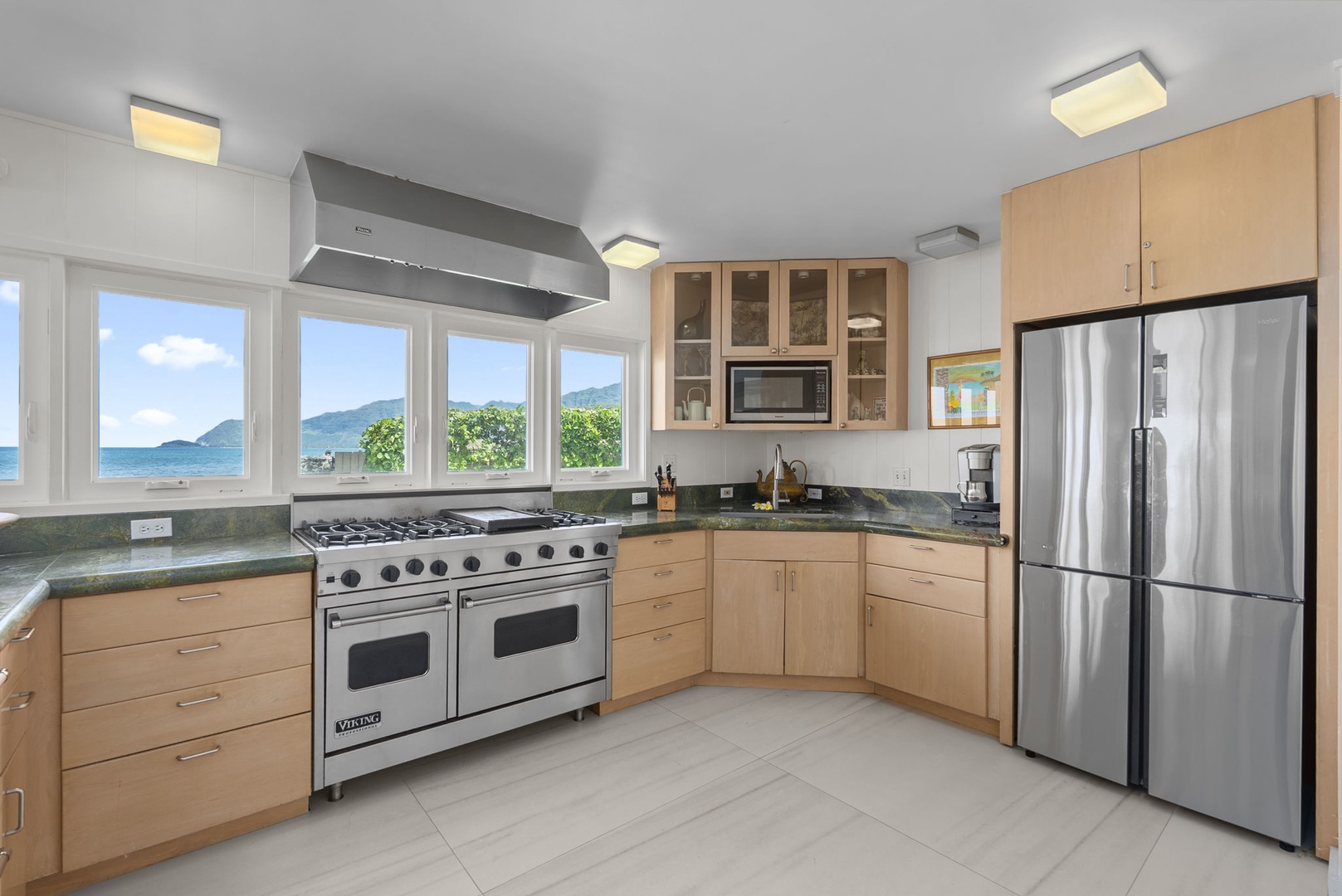 Waianae Vacation Rentals, Ma'ili Blue - Your fully equipped kitchen features stunning sea views while you cook, with premium appliances and ample counter space for memorable meal prep.