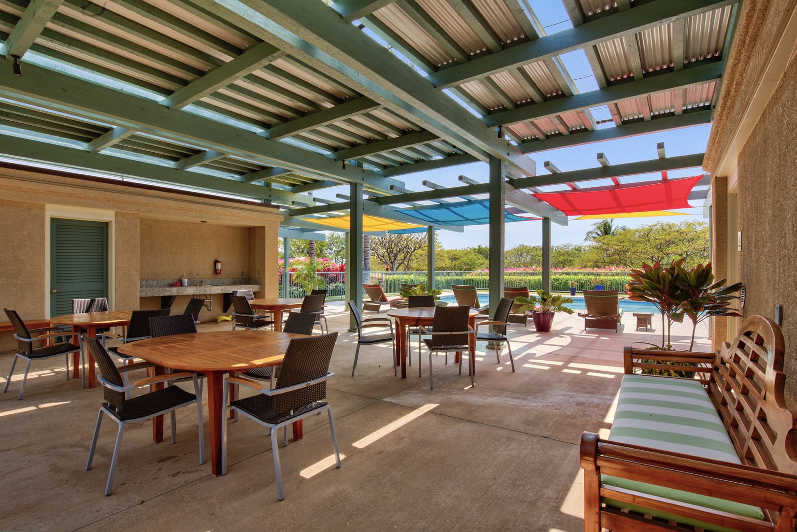 Kamuela Vacation Rentals, 2BD Kumulani (I-4) at Mauna Kea Resort - Covered amenities center picnic area with seating and outdoor BBQ grills.