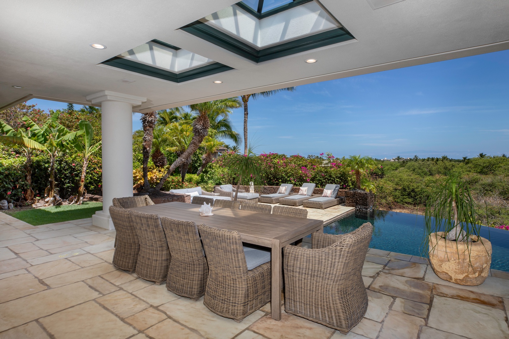 Kamuela Vacation Rentals, Canoe House at Champion Ridge - Spacious outdoor dining area with panoramic views, perfect for enjoying evening meals as the sun sets.