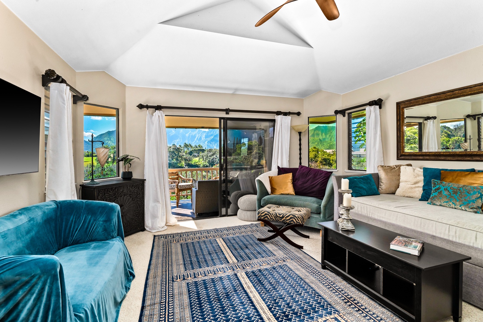 Princeville Vacation Rentals, Makanalani - Our open floorplan seamlessly leads to the lanai, blending indoor comfort with the beauty of outdoor living.
