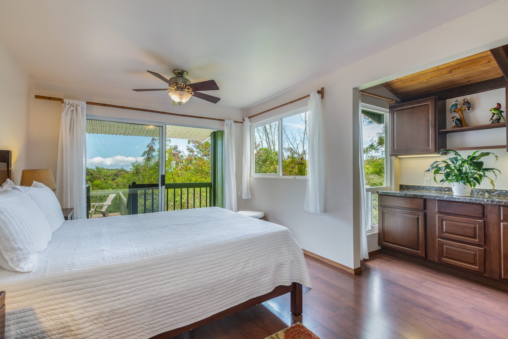 Princeville Vacation Rentals, Hale Ohia - This bedroom has a queen bed, ceiling fan, and ensuite bath