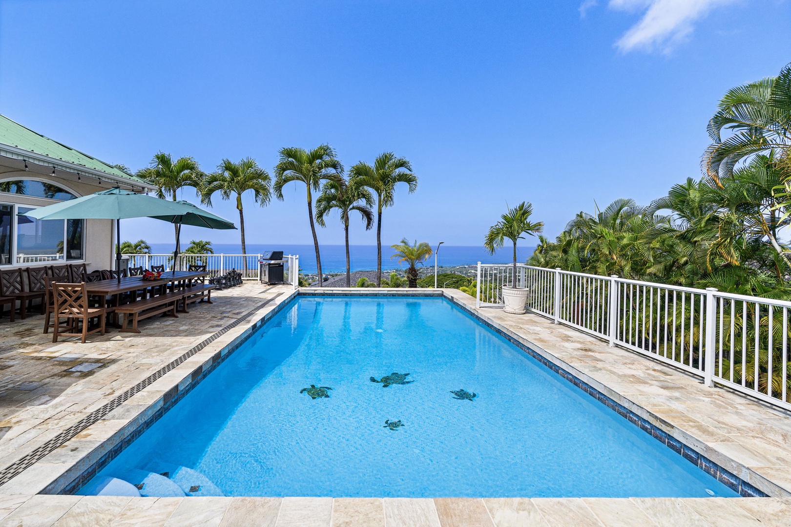Kailua-Kona Vacation Rentals, Honu Hale - Tropical paradise awaits with your private pool overlooking azure waters, surrounded by swaying palms and endless ocean views.