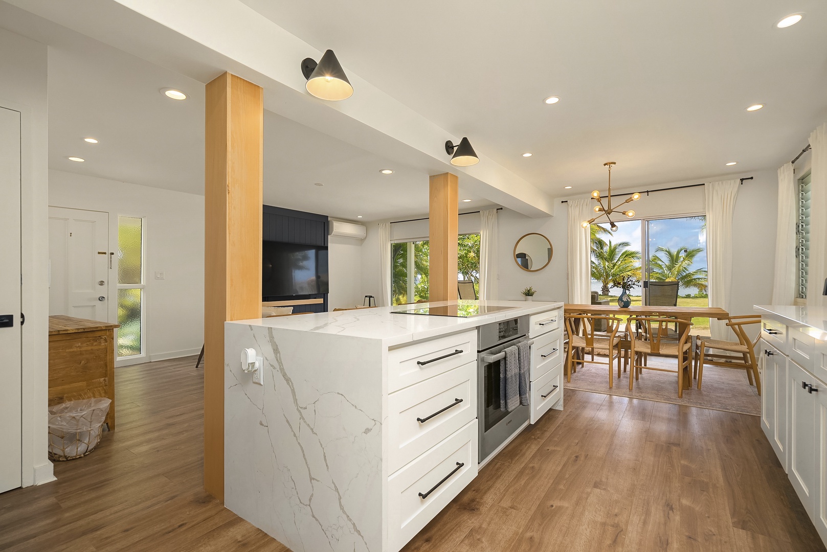 Honolulu Vacation Rentals, Honolulu Beachfront Retreat - Contemporary kitchen with marble countertops and bar seating for three.