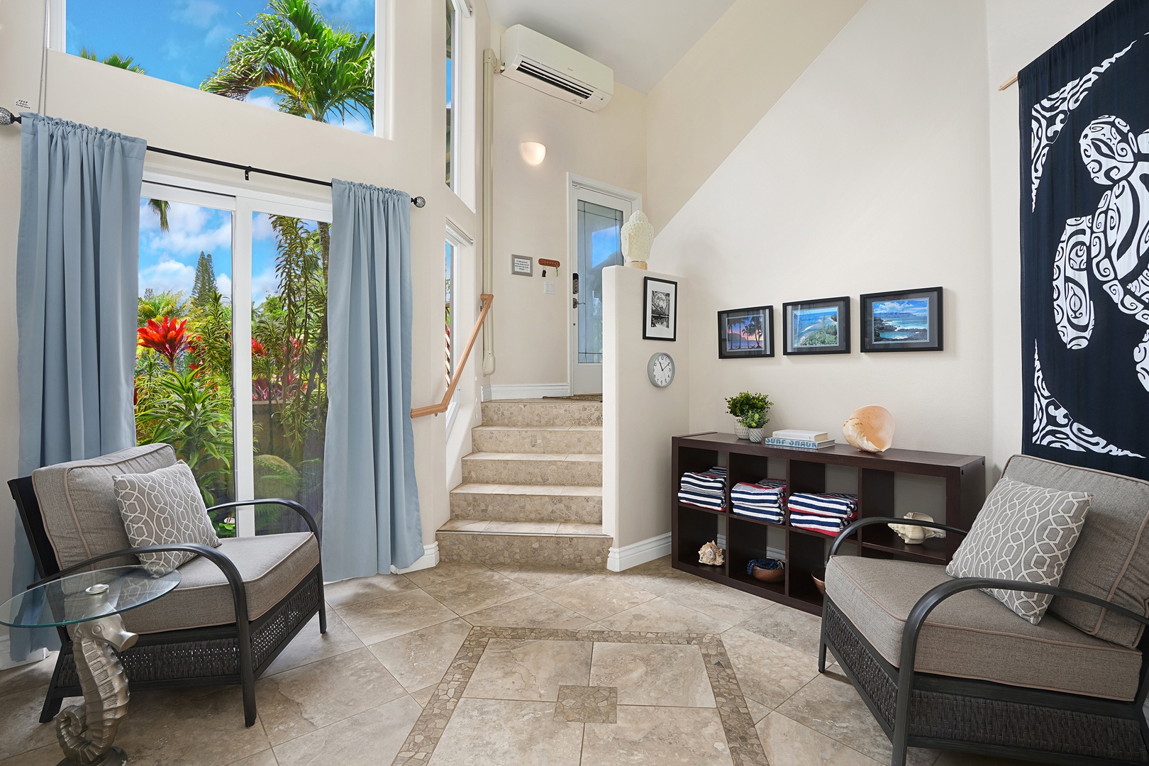 Princeville Vacation Rentals, Ku'u Lei Villa - The elegant entryway sets the tone for a relaxing stay, inviting you into a space of warmth and tranquility.
