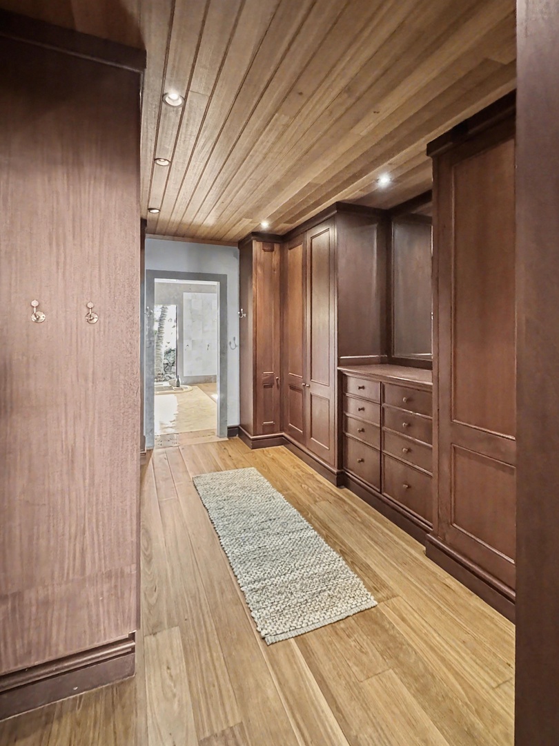 Kailua-Kona Vacation Rentals, Hahalua Bay Villa - Step into your private walk-in closet with custom cabinetry and warm wood finishes throughout.