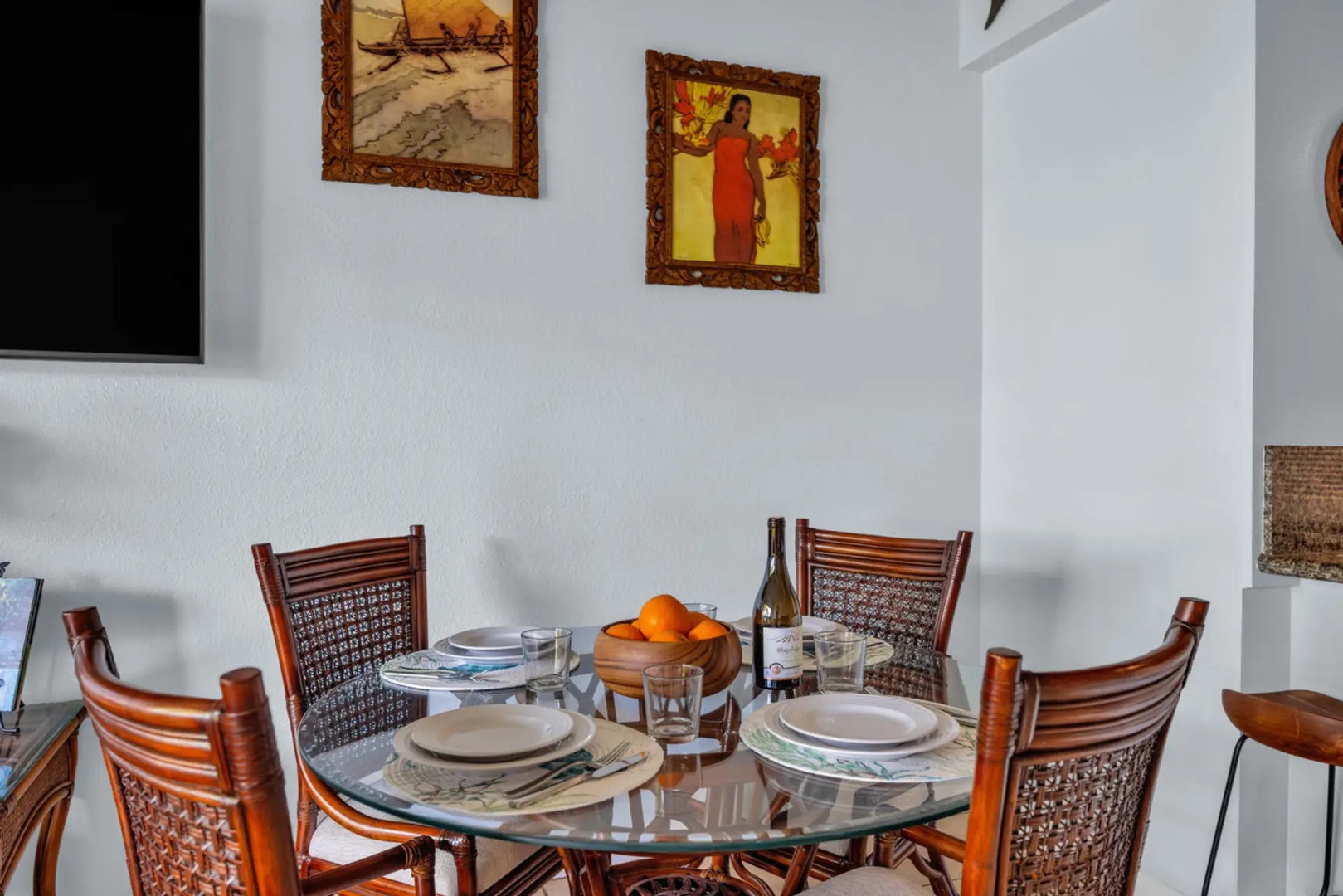 Kihei Vacation Rentals, Maui Vista 2420 - White place settings and a pair of vintage Hawaiian prints set the tone before the first meal.