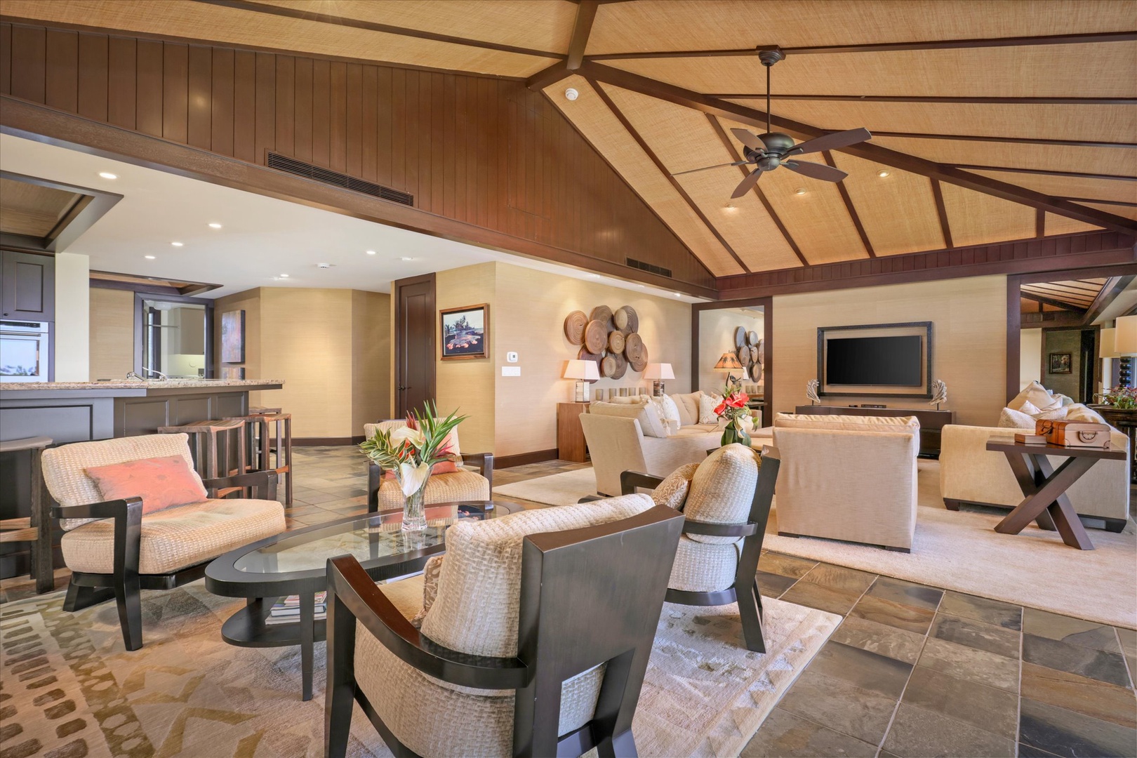 Kailua Kona Vacation Rentals, Wai'ulu Villa 115D - Open-concept layout with plush seating and custom artwork—ideal for entertaining or serene relaxation.