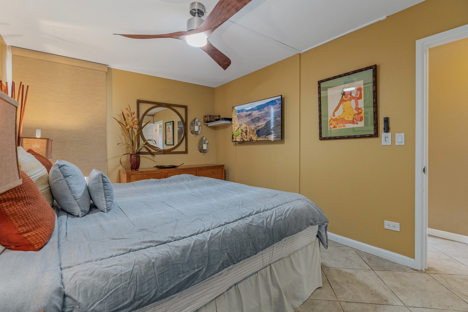 Kihei Vacation Rentals, Kamaole Sands 5310 - Catch a show from the king bed before lights out, TV mounted right across from it.