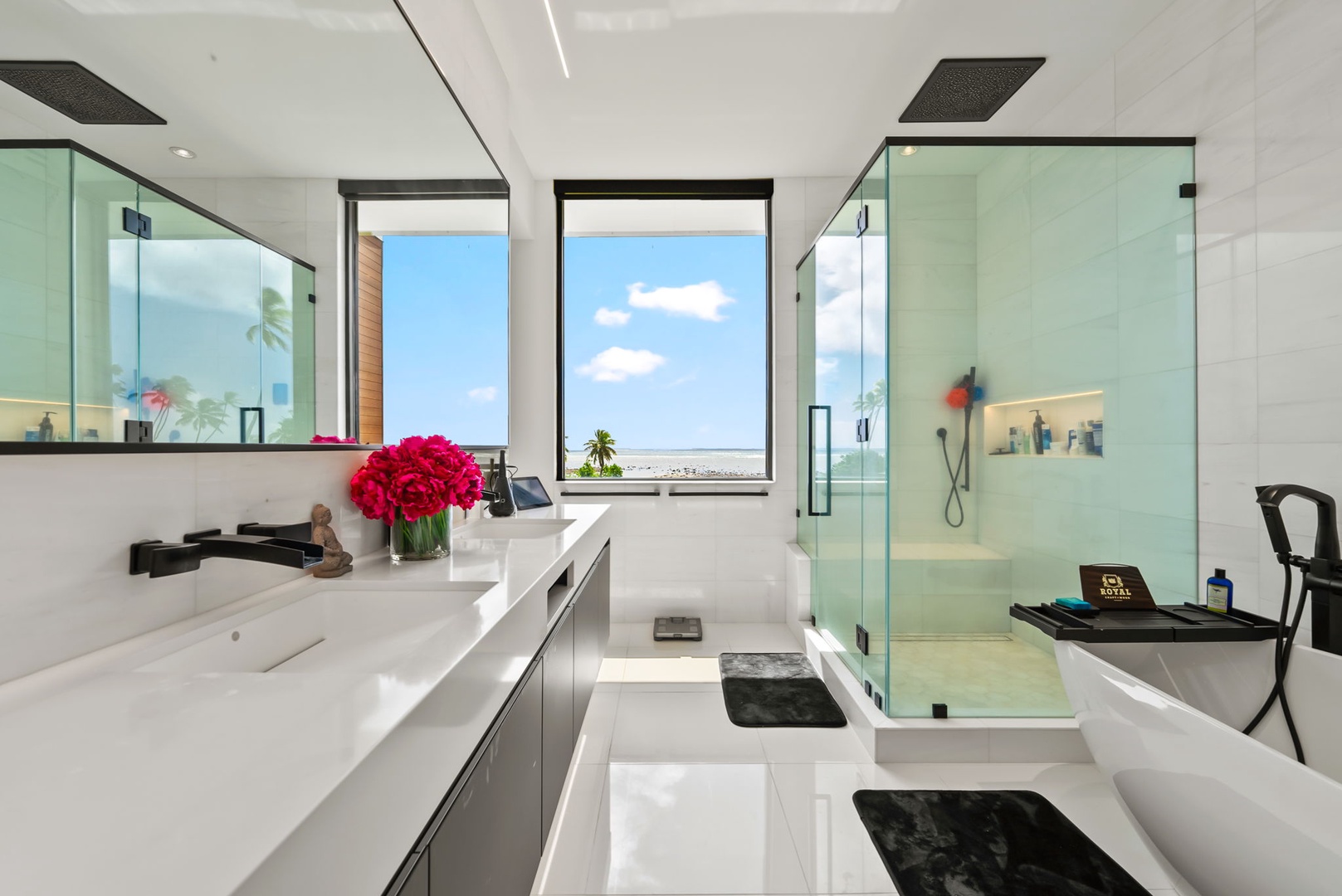 Honolulu Vacation Rentals, Ocean Villa Emilie - Ocean views and clean lines—this bathroom offers a resort-level spa experience from the comfort of home.