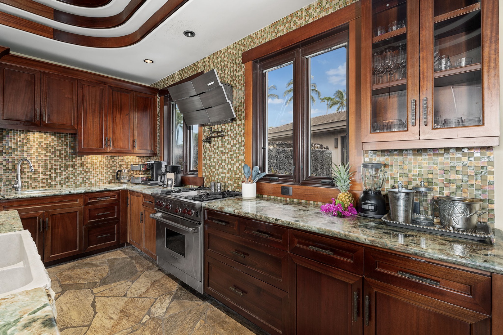 Kamuela Vacation Rentals, Hale Konane - Entertain effortlessly in the spacious kitchen with premium appliances and island seating.