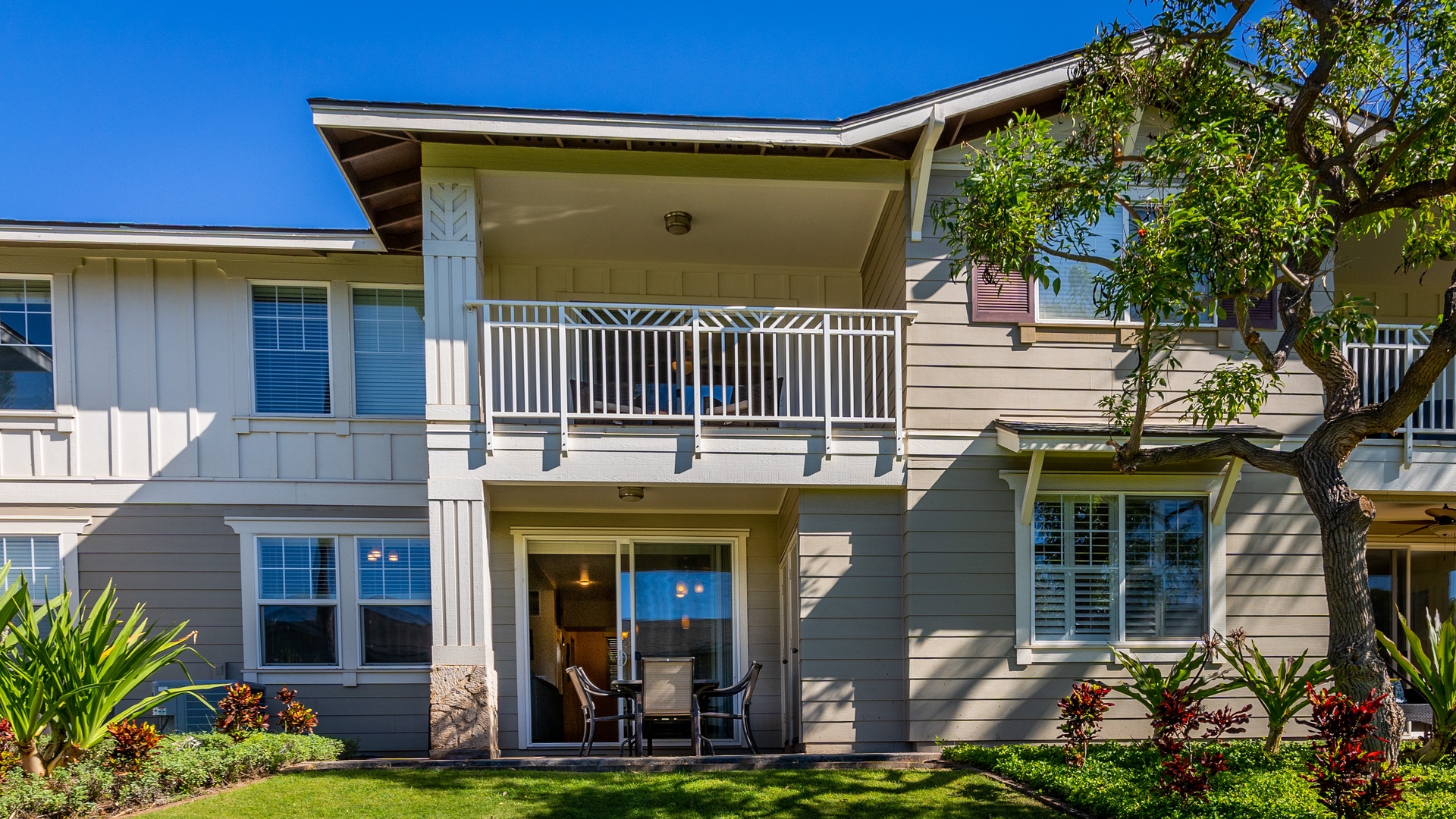 Kapolei Vacation Rentals, Ko Olina Kai 1033C - An outside view of the condo with manicured lawns.