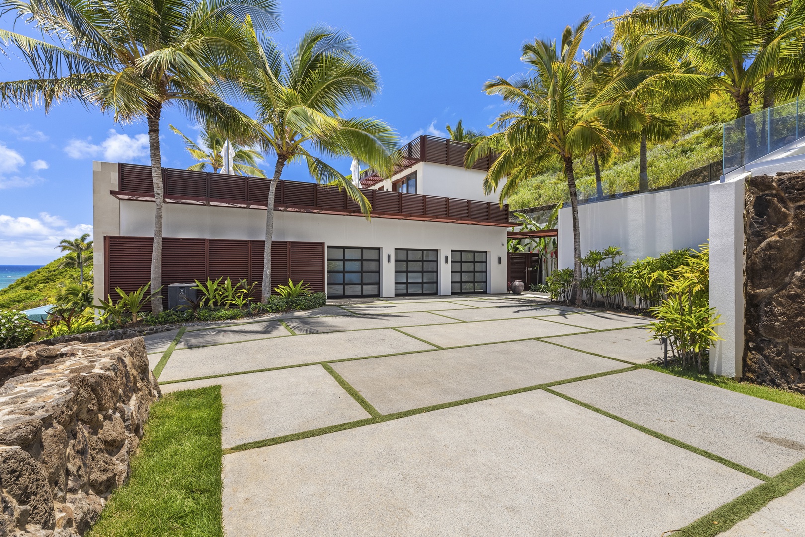 Kailua Vacation Rentals, Lanikai Hillside Estate - Garage and carport driveway with plenty of space for parking and easy access to the estate.