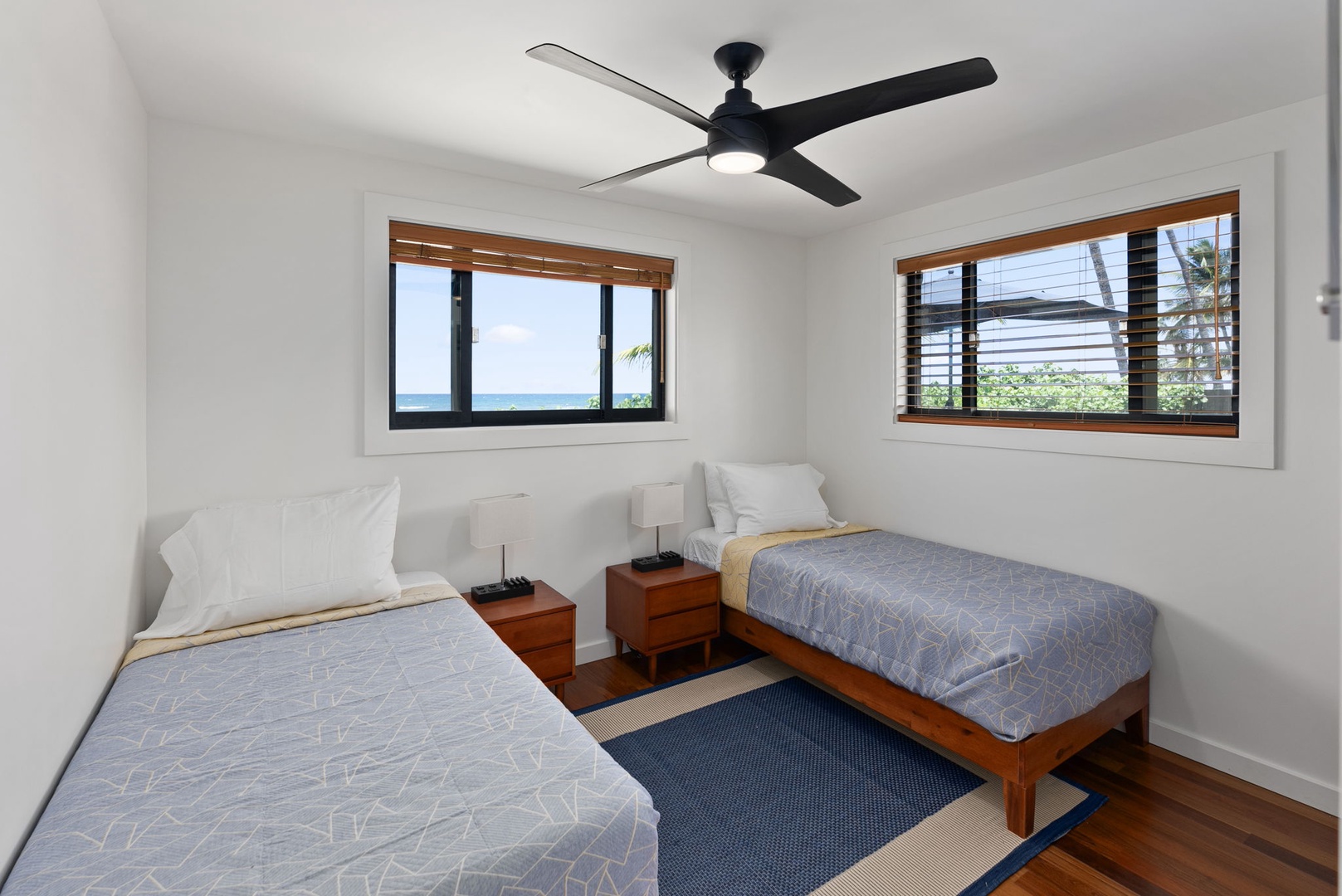 Waialua Vacation Rentals, Mokuleia Beach Villa** - The second guest bedroom has two twin beds, blackout drapes and ceiling fan.