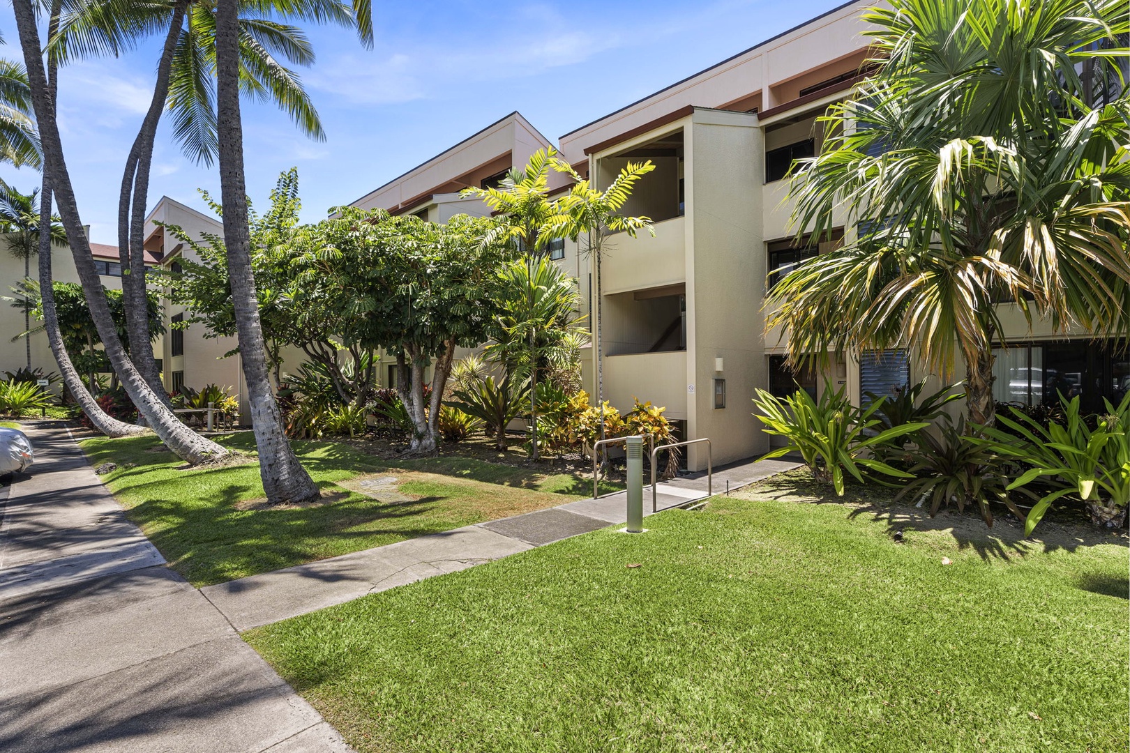 Kailua Kona Vacation Rentals, Keauhou Kona Surf & Racquet 1104 - Serene condo oasis nestled amidst lush tropical greenery – your private escape in paradise.