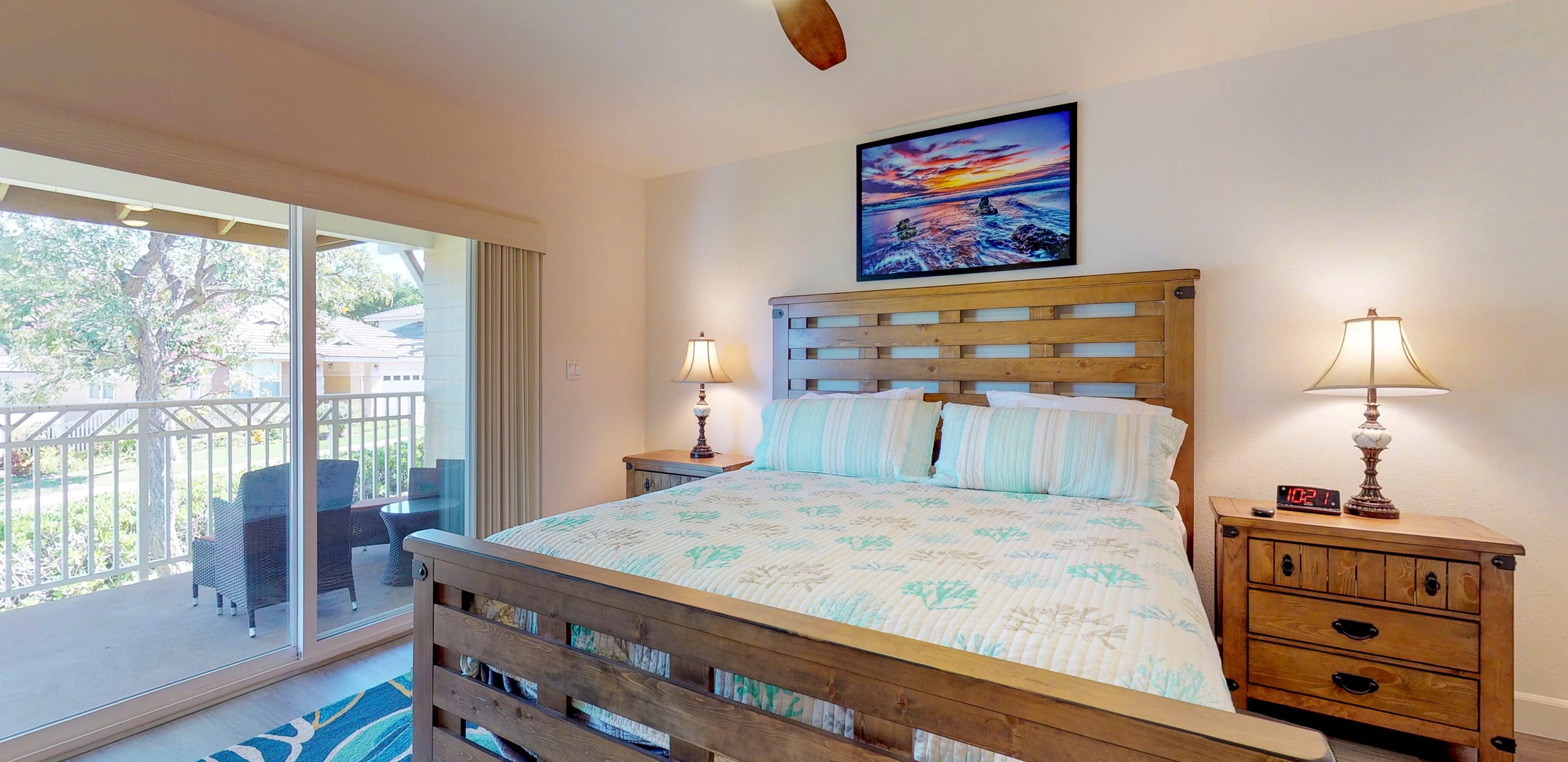 Kapolei Vacation Rentals, Ko Olina Kai 1051D - The upstairs primary guest bedroom featuring soft linens and tropical decor.
