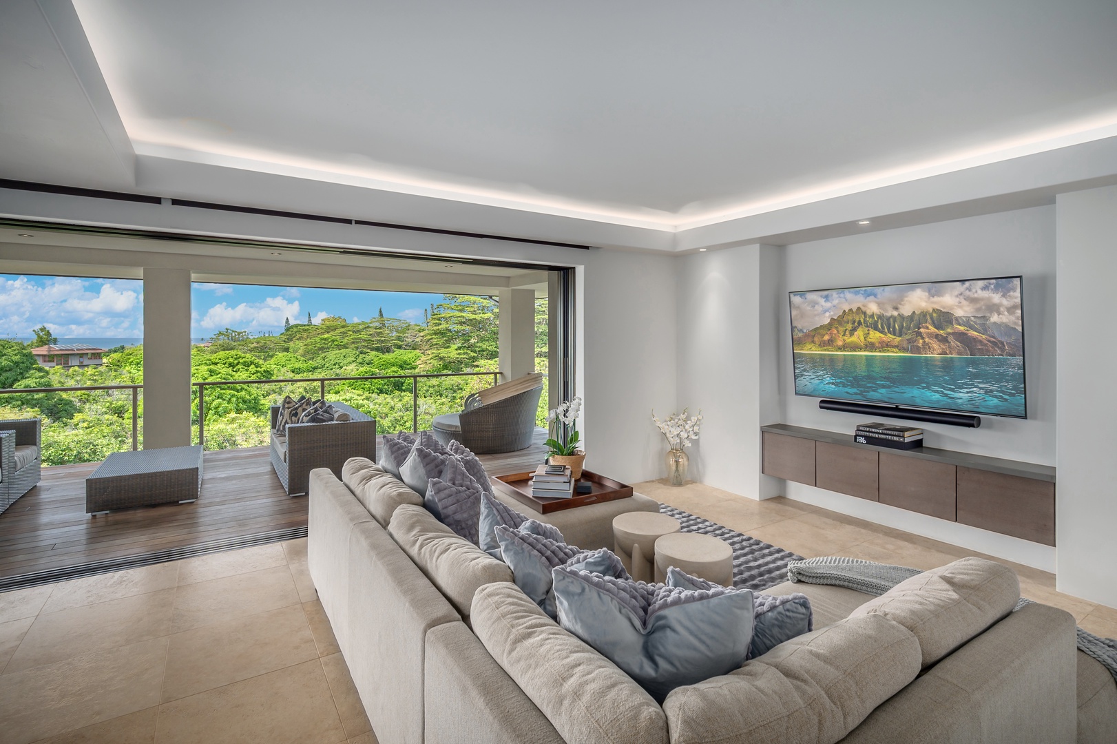 Princeville Vacation Rentals, Hanalei Plantation Villa - Living area equipped with a flat screen TV and Sonos sound system, perfect for movie nights and entertainment.