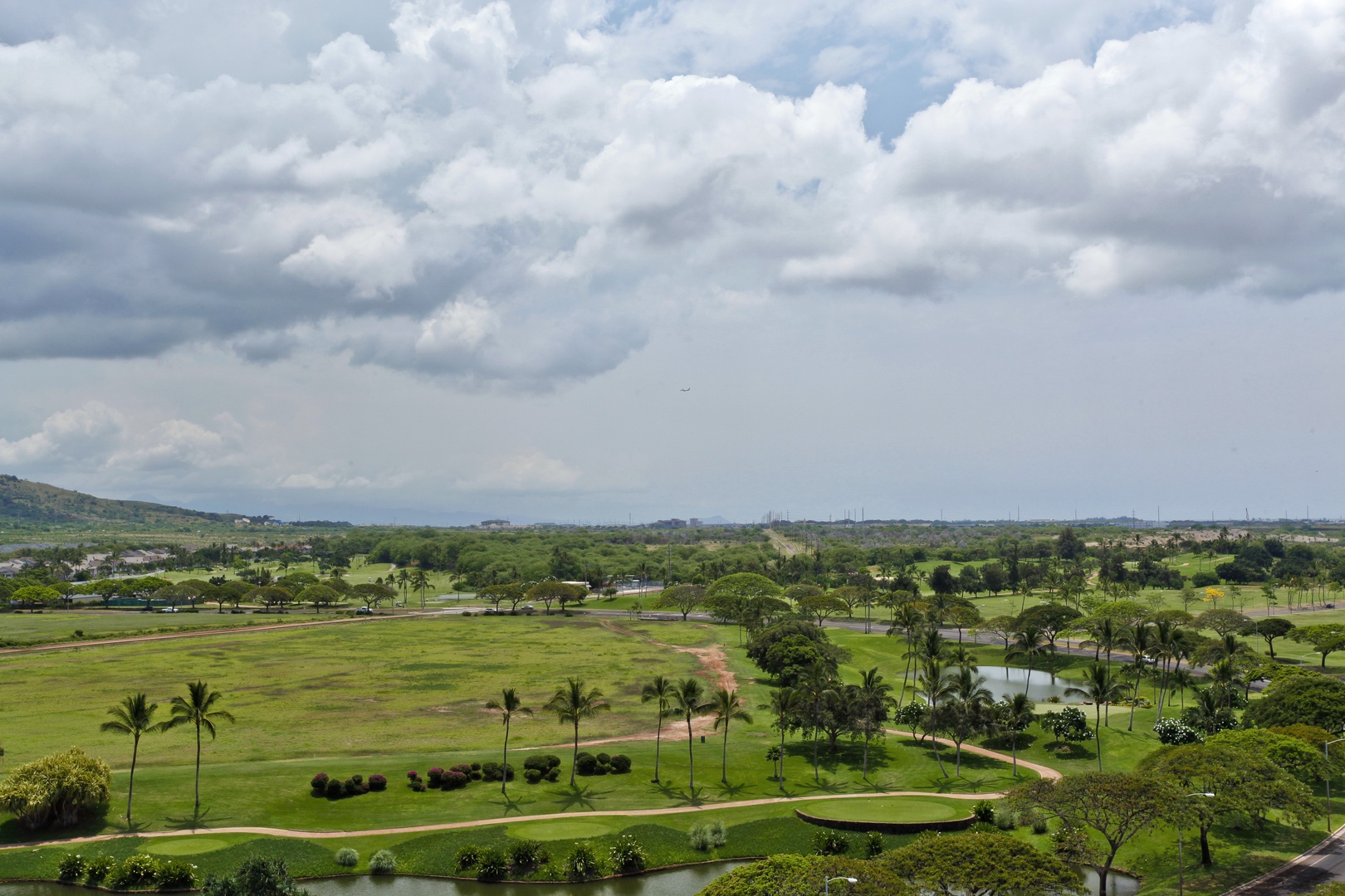 Kapolei Vacation Rentals, Ko Olina Beach Villas O1121 - The golf course with lush green landscaping.