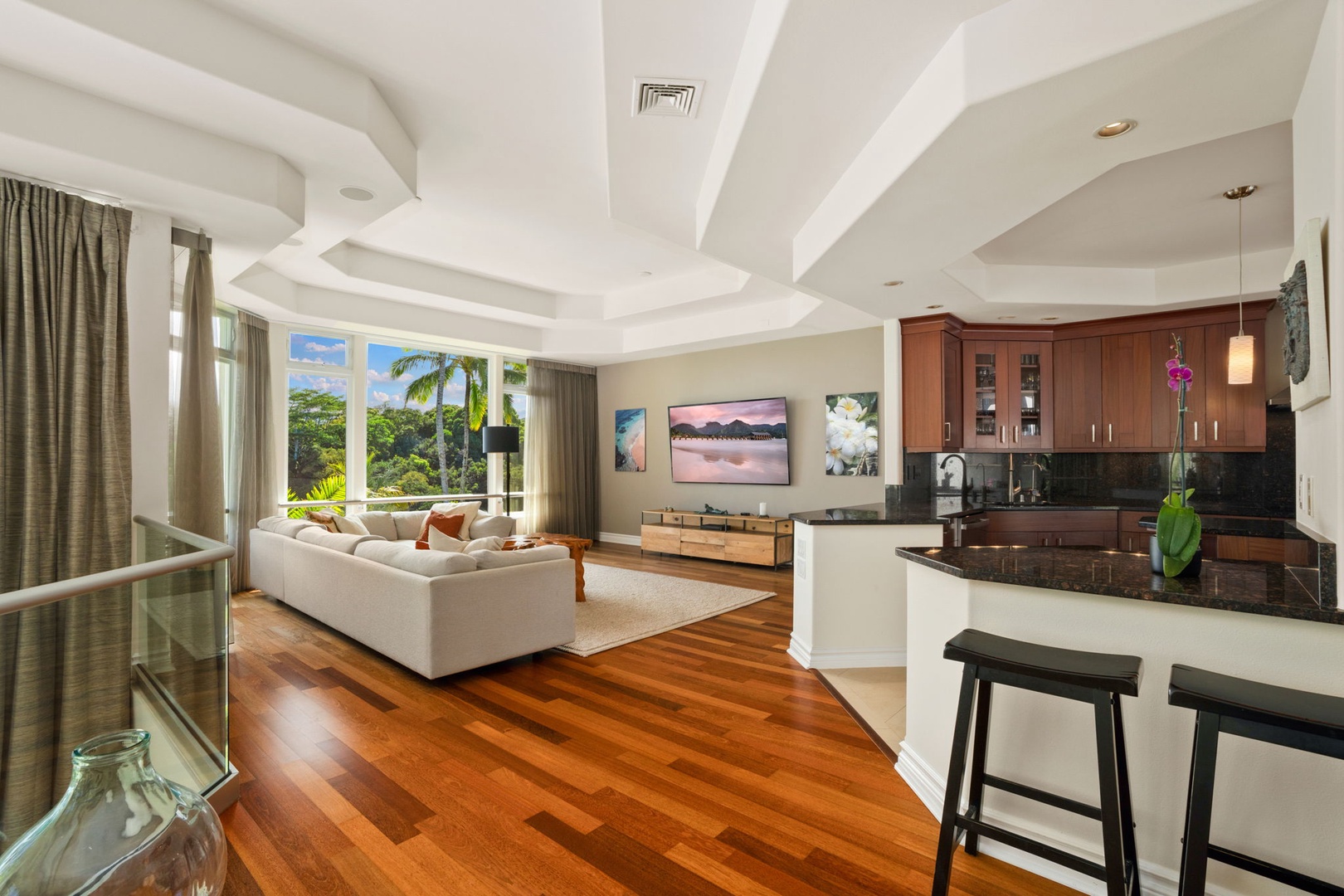 Princeville Vacation Rentals, Kaiulani #8 - Cook at the island while conversation carries across the open upstairs great room.