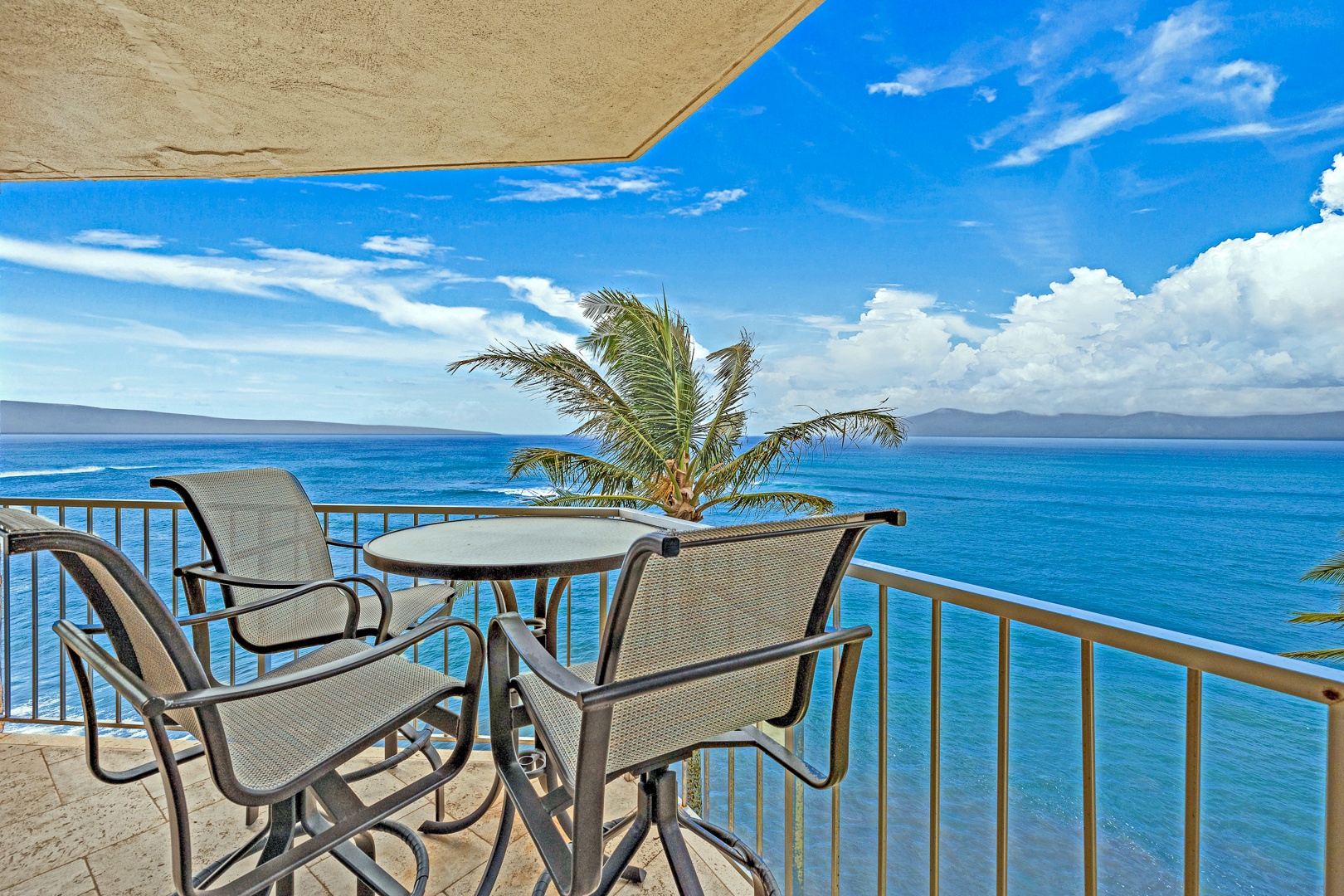 Lahaina Vacation Rentals, Royal Kahana 610 - Sit back and take in the ocean breeze from this perfect lanai seating spot.