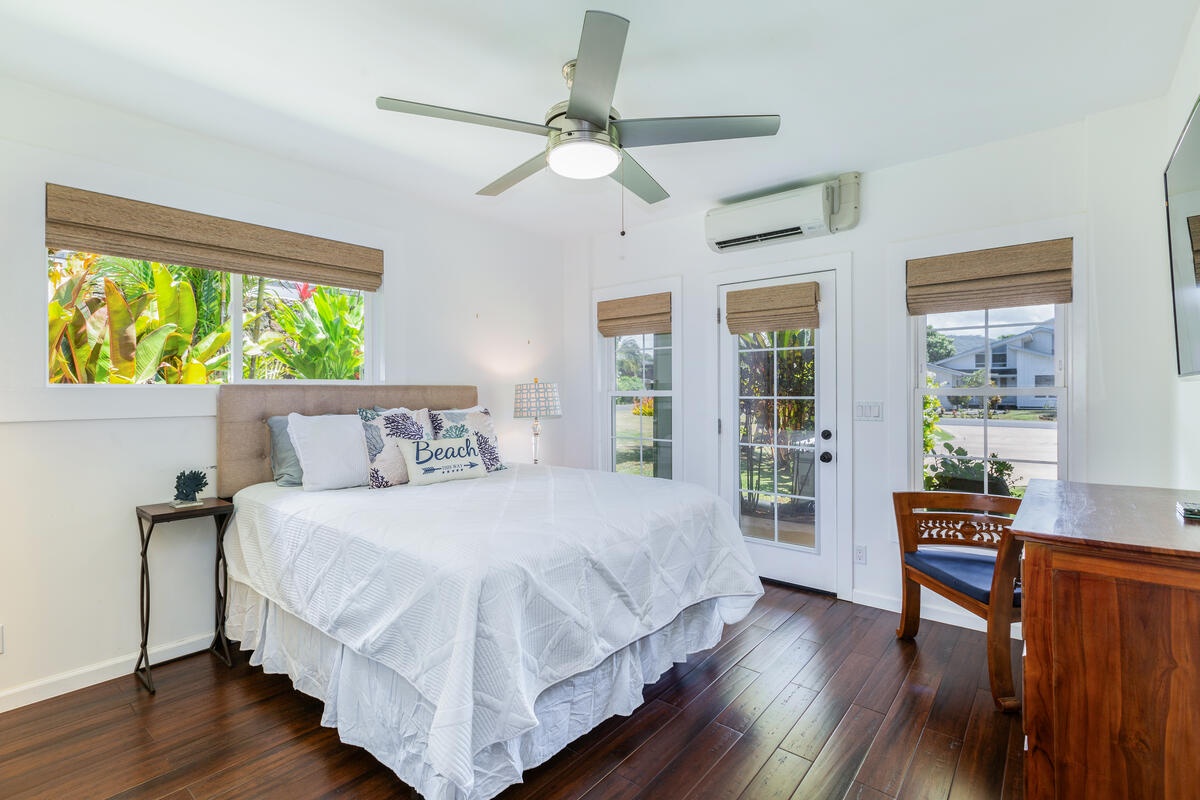 Princeville Vacation Rentals, Hokulani Villa - The guest bedroom three has a full-sized bed, split AC, and ceiling fan.