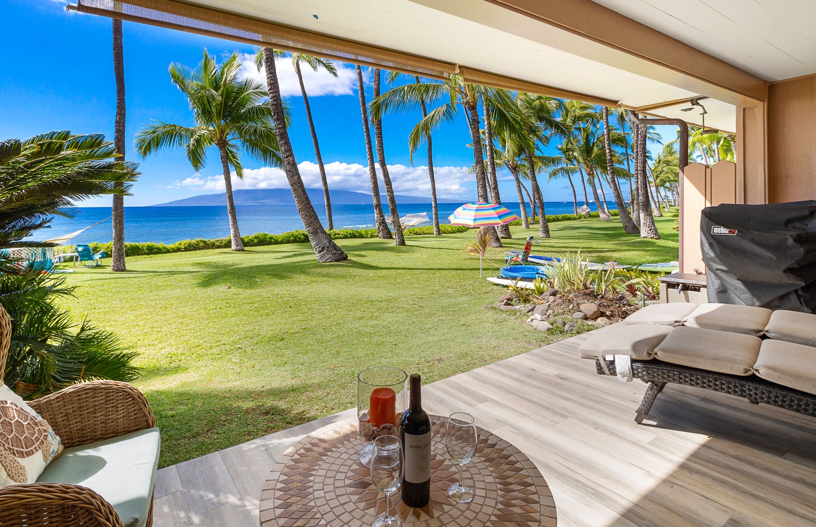 Lahaina Vacation Rentals, Puamana 240-3 - Enjoy a peaceful retreat on the lanai with stunning tropical surroundings.