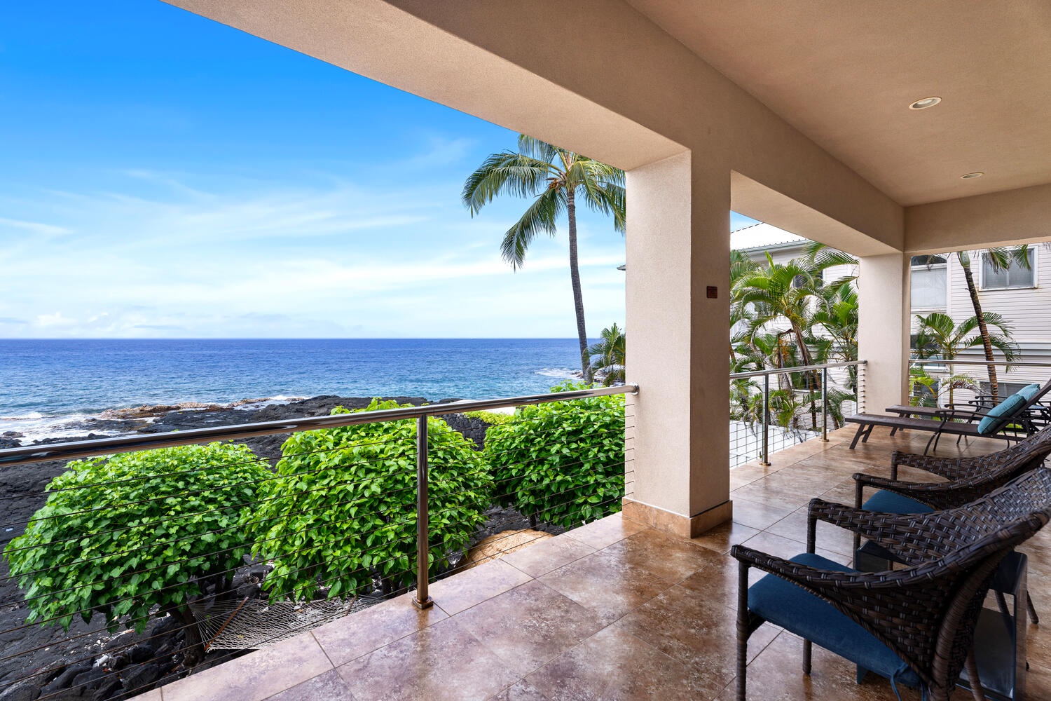 Kailua Kona Vacation Rentals, Kailani Vista - The large lower Lanai connects the Primary bedroom and Junior Primary bedroom, perfect for watching the ocean come to life!