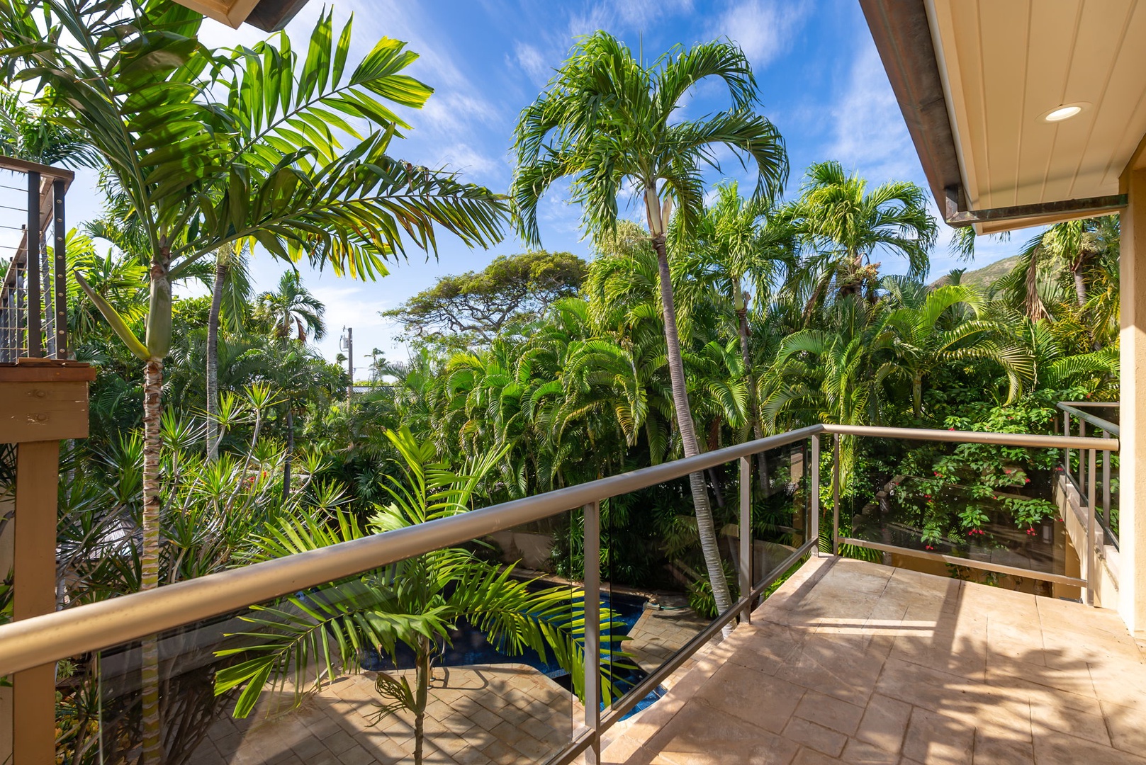 Honolulu Vacation Rentals, Diamond Head Luxe - Step onto your private lanai and breathe in the tropical paradise surrounding you, with swaying palms and lush greenery creating your serene escape.