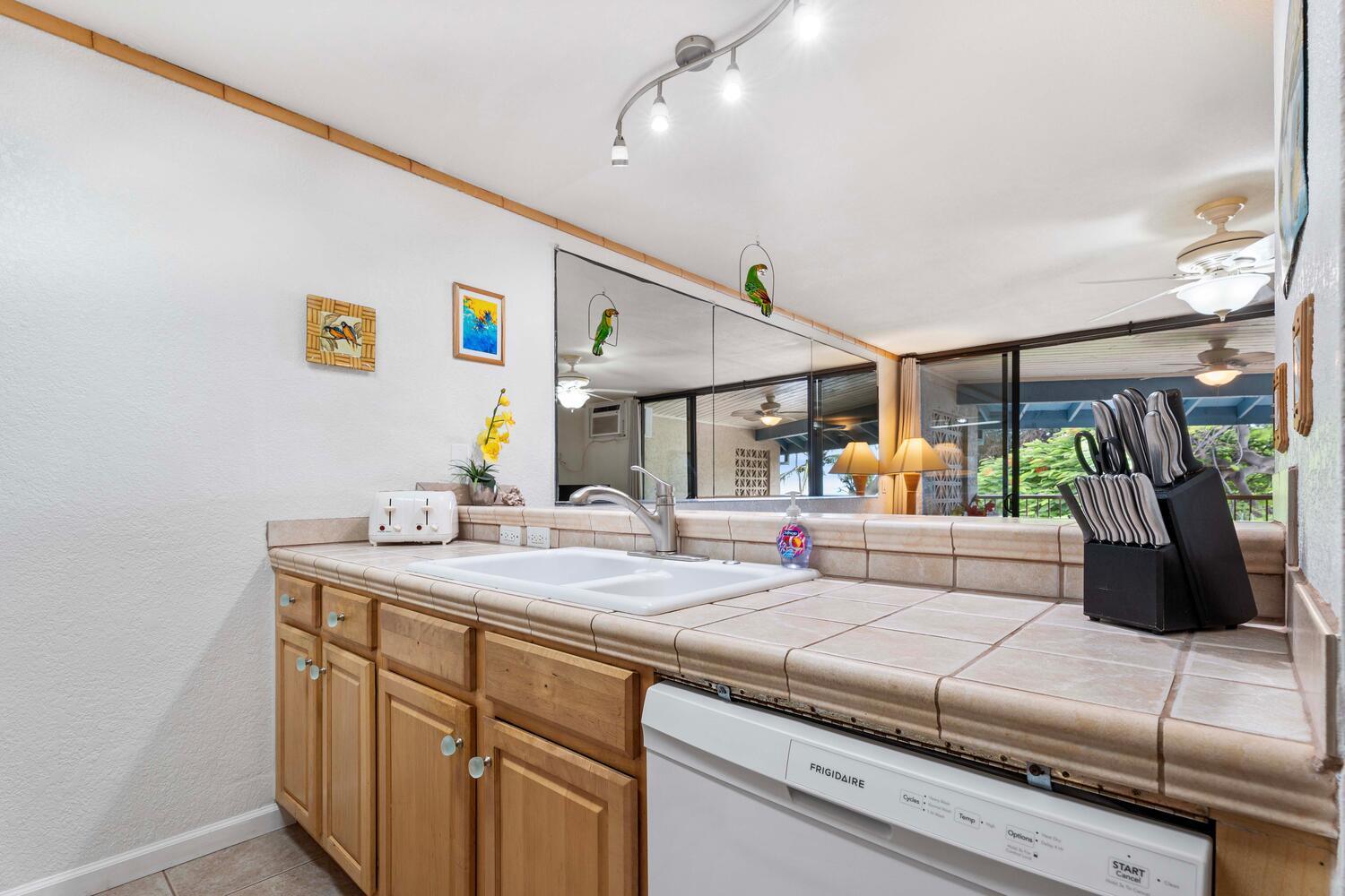 Kailua-Kona Vacation Rentals, Kona Reef B32 - Prep meals conveniently in the kitchen and enjoy the views!