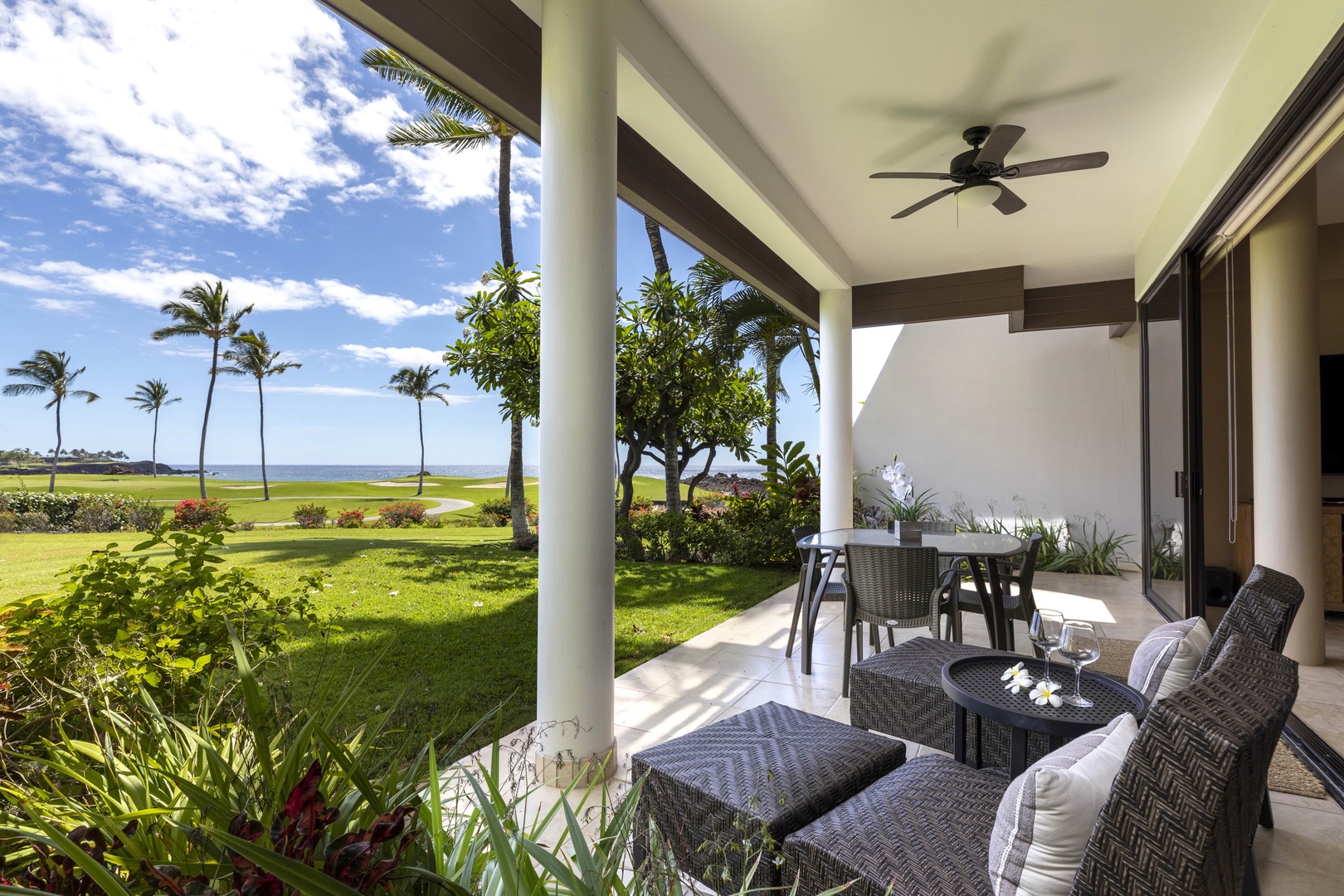 Kamuela Vacation Rentals, Mauna Lani Point E105 - Enjoy alfresco dining or lounging on your ocean view lanai.