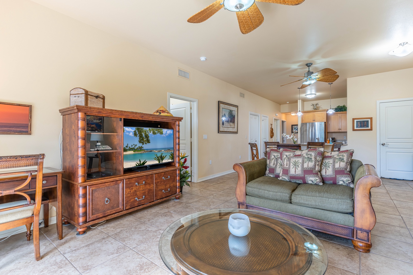 Kapolei Vacation Rentals, Kai Lani 8B - Sink into the plush seating in the living area surrounded by natural wood tones.