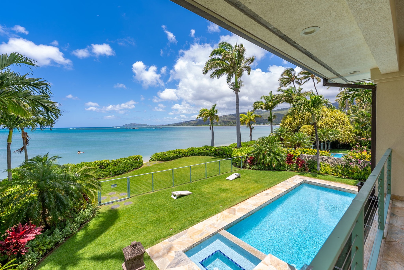 Honolulu Vacation Rentals, Maunalua Estate - A private pool and oceanfront lawn create the perfect setting for sun-filled island afternoons.
