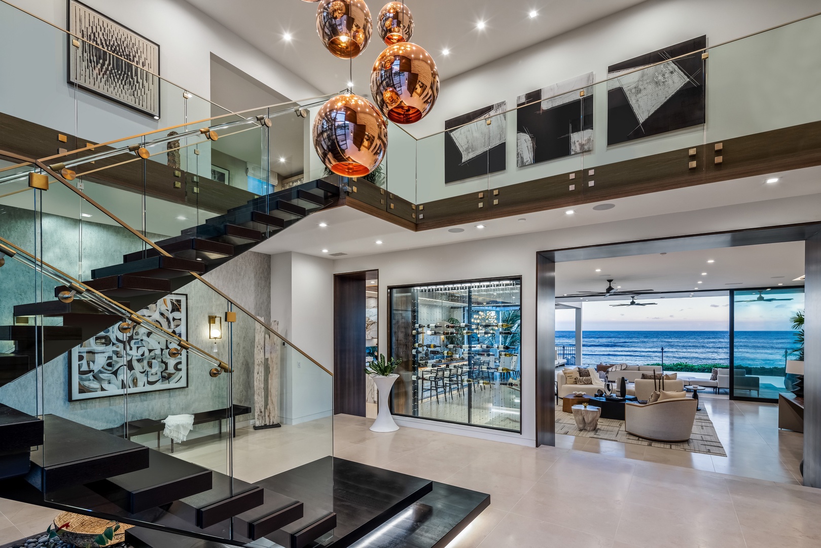 Honolulu Vacation Rentals, Diamond Head Grand Escape - Make a striking entrance with the dramatic floating staircase, accented by sculptural lighting.