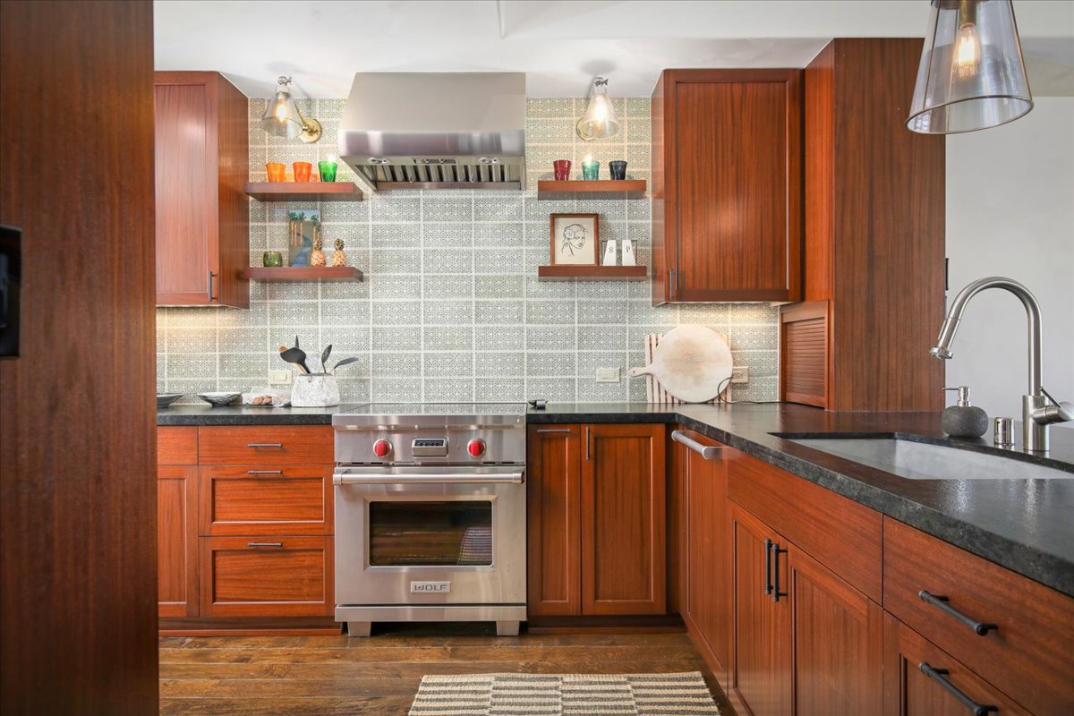 Kailua Kona Vacation Rentals, 3BD Ka'ulu Villa (129B) at Hualalai Resort - Indulge your culinary expertise in the kitchen area with top-tier appliances, plenty of storage and counter spaces.