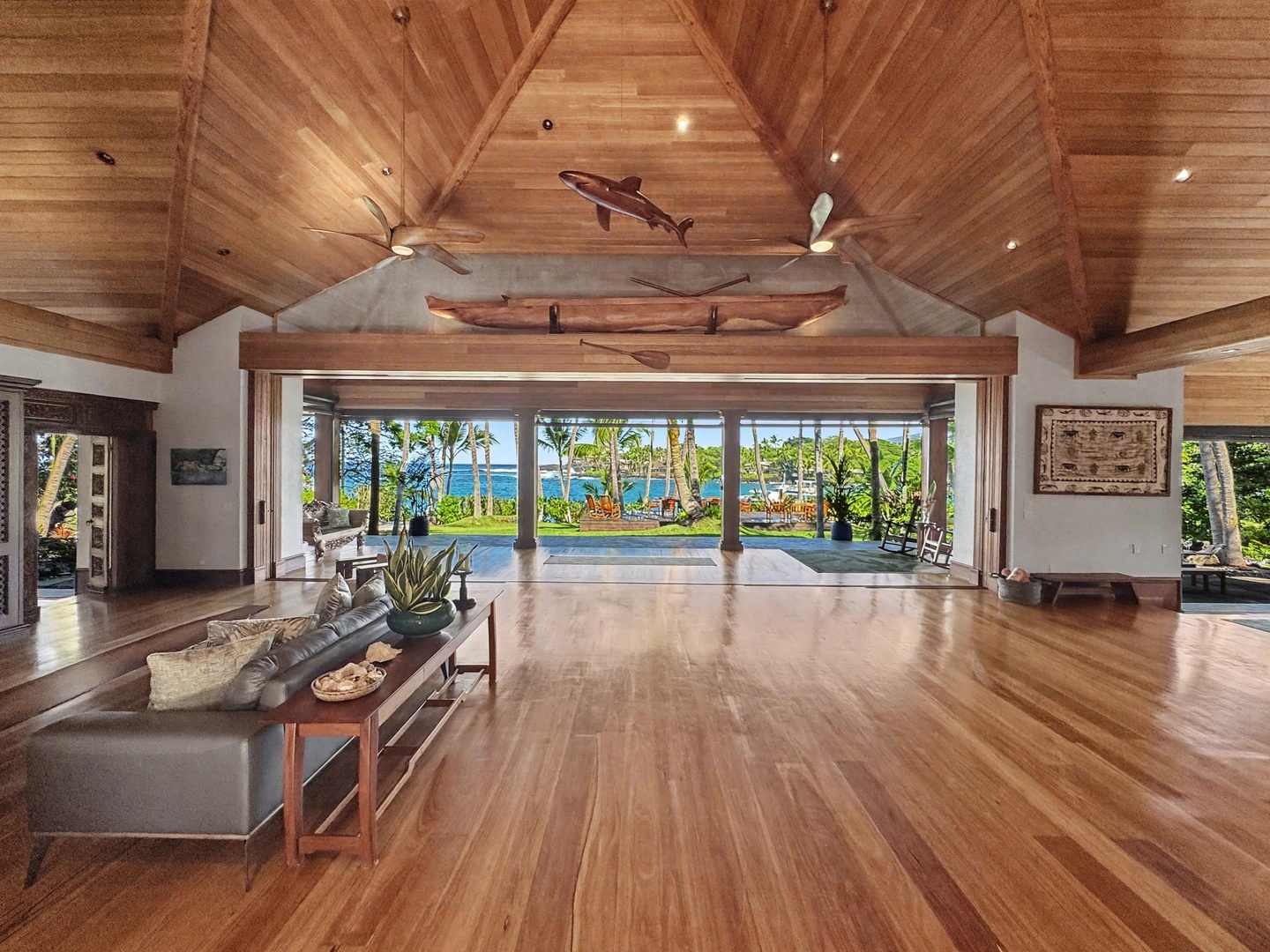 Kailua-Kona Vacation Rentals, Hahalua Bay Villa - Unwind in your stunning open-concept living space with soaring wood ceilings and breathtaking ocean views flowing seamlessly from indoors to paradise.