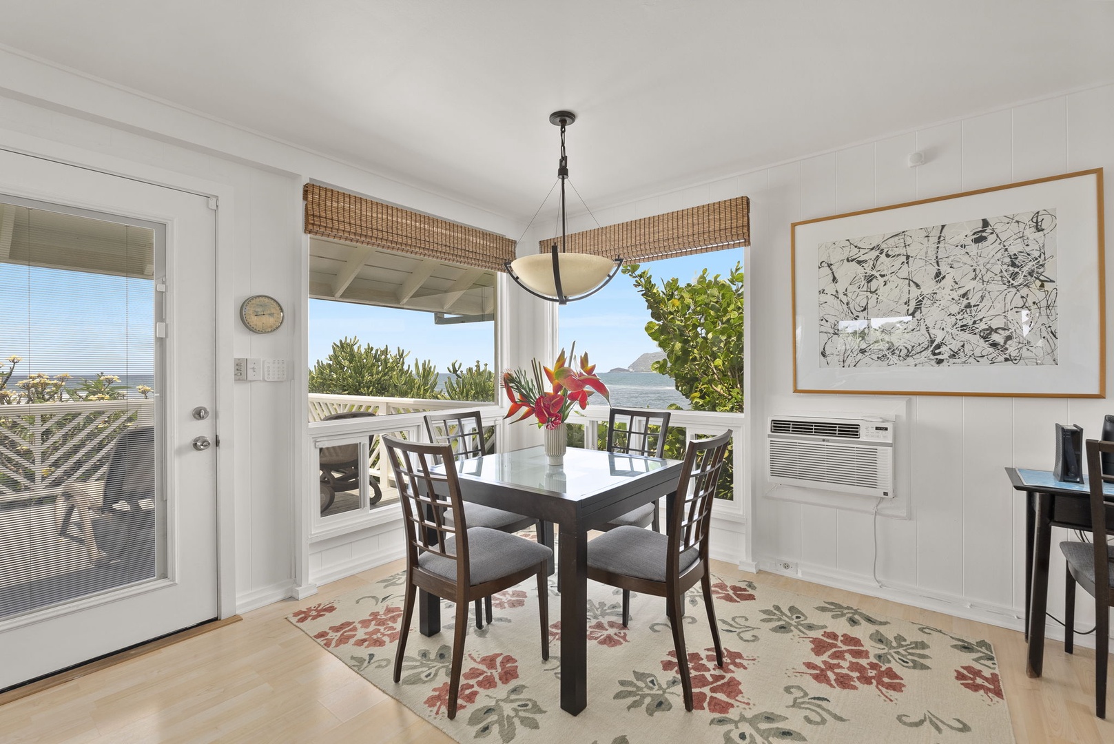 Waianae Vacation Rentals, Ma'ili Blue Estate - The bright cottage dining space opens to stunning ocean views, where morning coffee feels like a retreat.