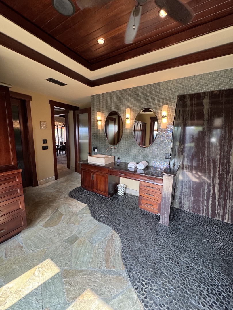 Kamuela Vacation Rentals, Hale Konane - Luxurious spa-inspired bathroom with dual vanities and a sleek, open shower.