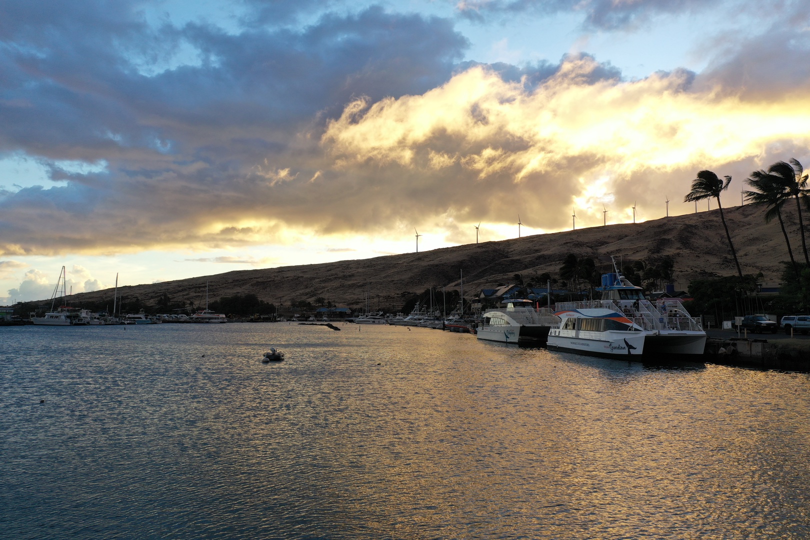 Wailuku Vacation Rentals, Milowai 310 - Maalaea Harbor turns gold at day's end, boats resting after a day on the water.