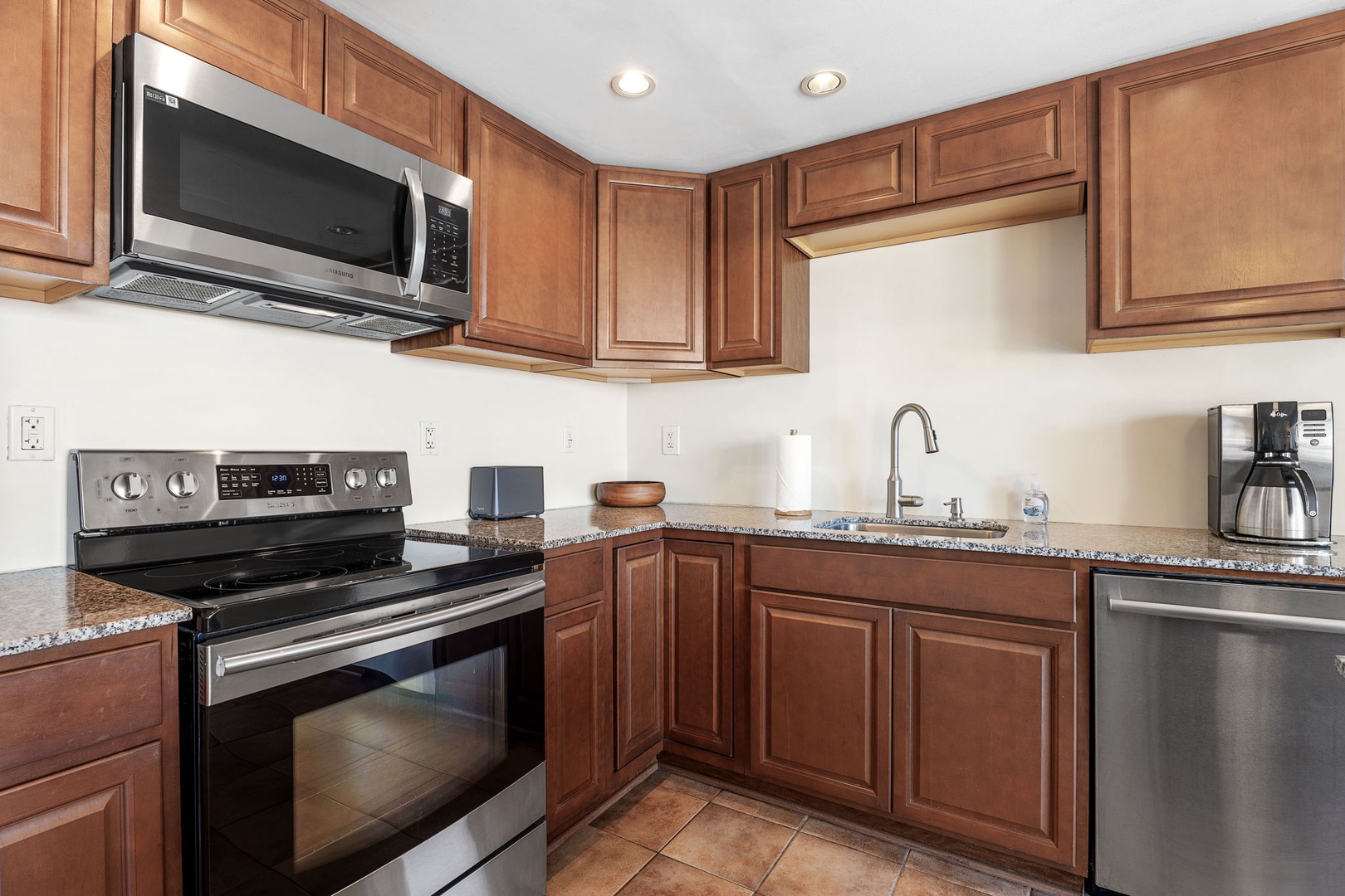 Kailua Kona Vacation Rentals, Kona Plaza 201 - Functional and modern kitchen, fully equipped for your cooking adventures.