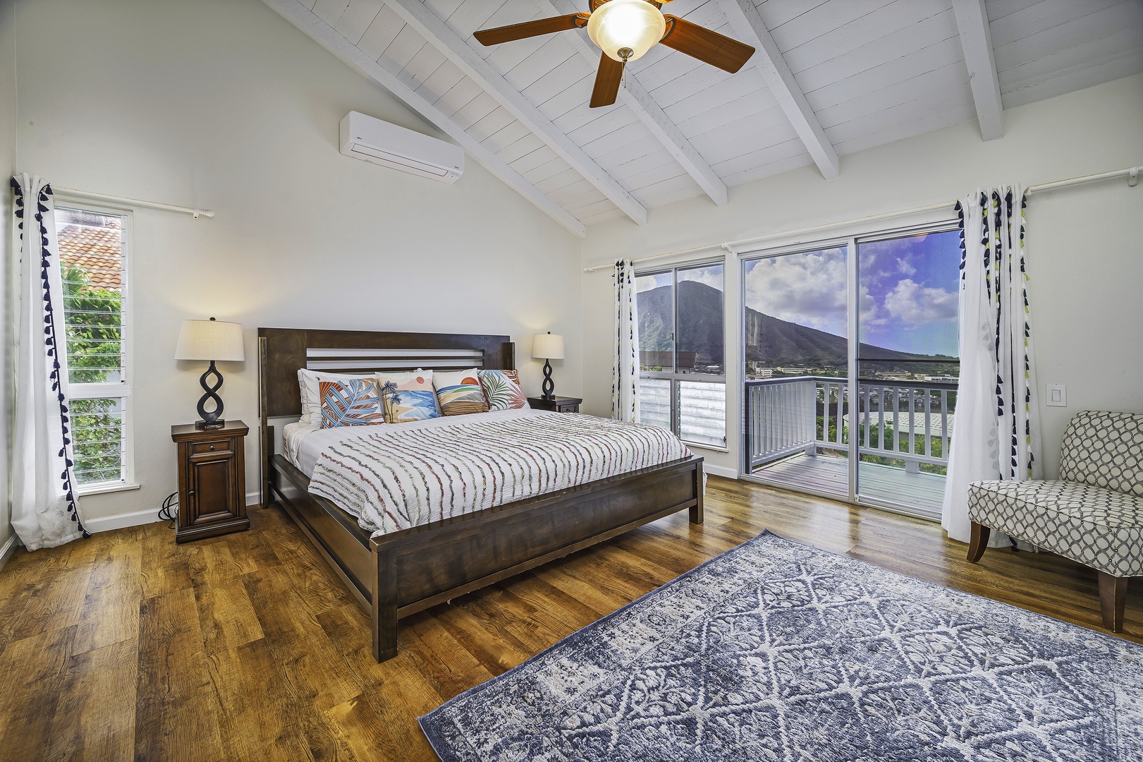Honolulu Vacation Rentals, Hale Malia - The primary bedroom has a king bed, ensuite bath, and and outstanding ocean and mountain views