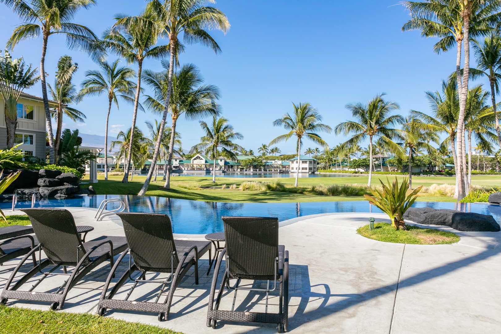 Waikoloa Vacation Rentals, Fairway Villas at Waikoloa Beach Resort E34 - Loungers provided while you sunbathe or read a book