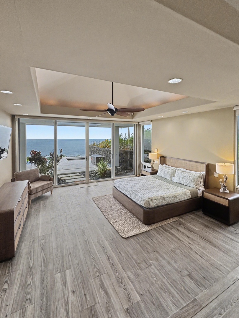 Kailua Kona Vacation Rentals, Hale Nai'a - Wake up to breathtaking ocean views in your serene bedroom sanctuary, where floor-to-ceiling windows frame the endless sea horizon.