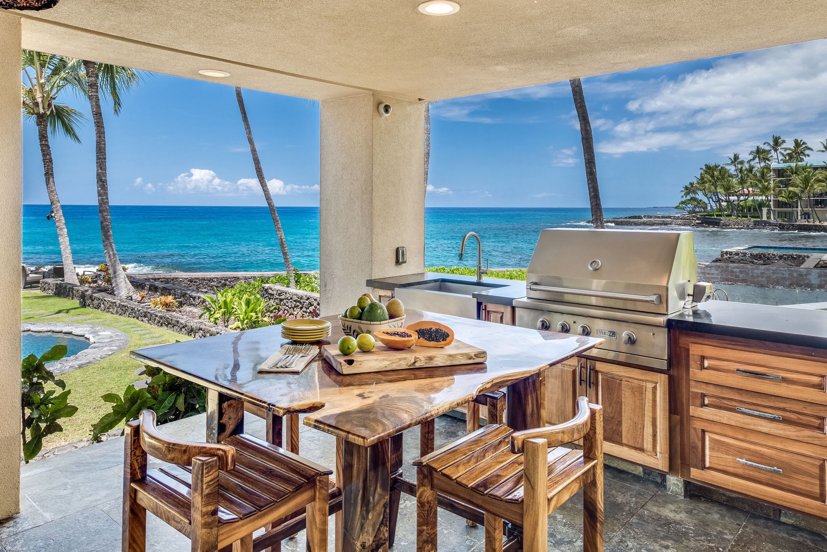 Kailua Kona Vacation Rentals, Kona Beach Bungalows** - Fire up the grill for an alfresco feast on Moana Lanai's BBQ area.