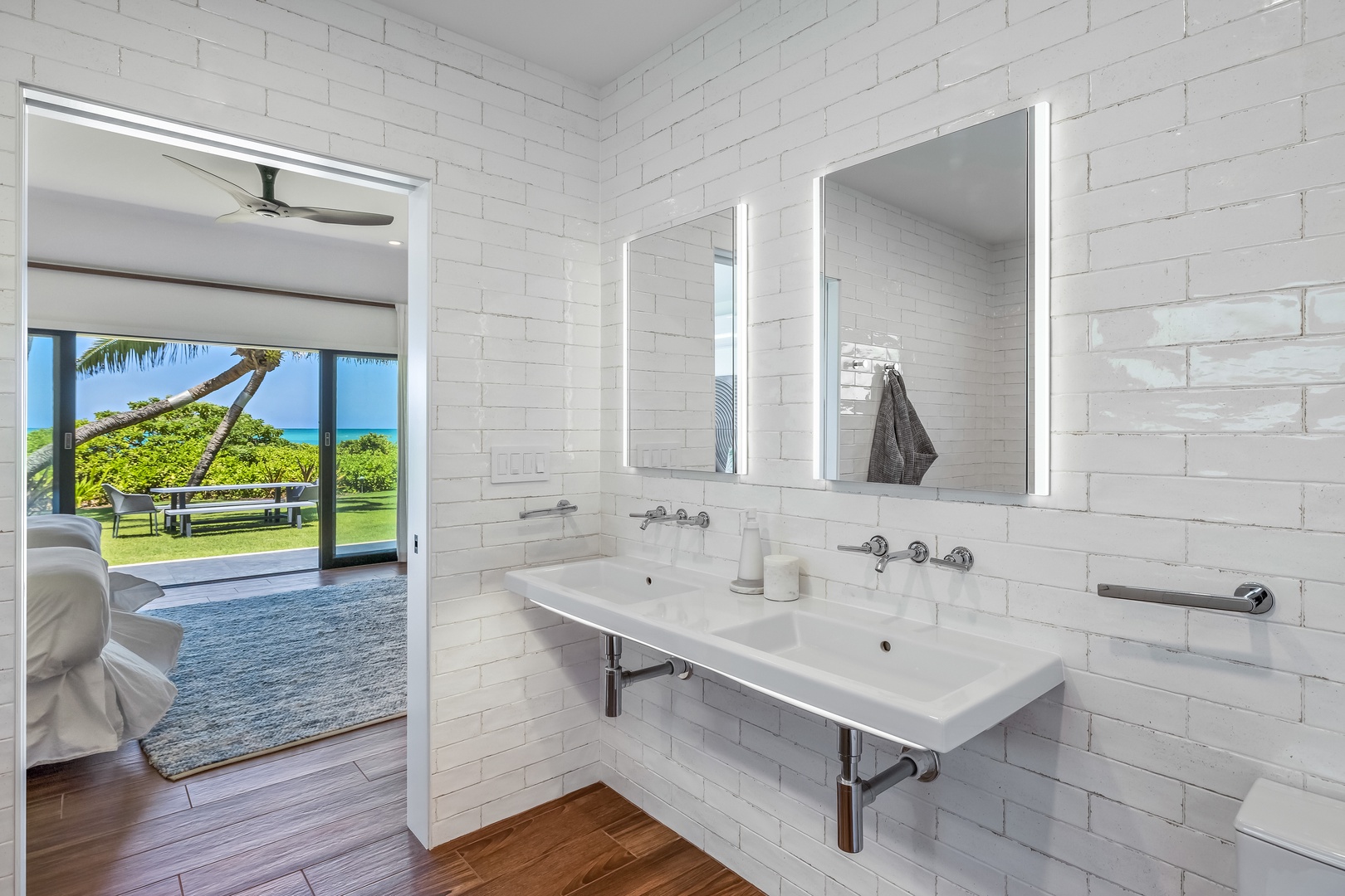 Kailua Vacation Rentals, Kailua Beach Villa - Makai North suite ensuite bathroom with dual sink and a walk-in shower