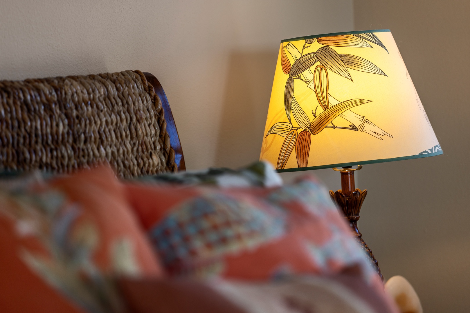 Unwind in your cozy bedroom with tropical-inspired lighting and woven textures that create the perfect ambiance for relaxation.