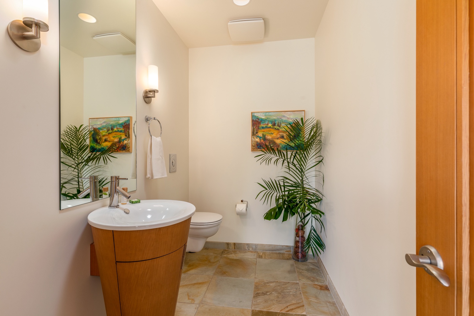 Kamuela Vacation Rentals, Mauna Kea Resort Bluffs 22 - The Beach House - A chic powder room with refined wood accents: stylish, functional, and perfectly located close to the kitchen and family room.