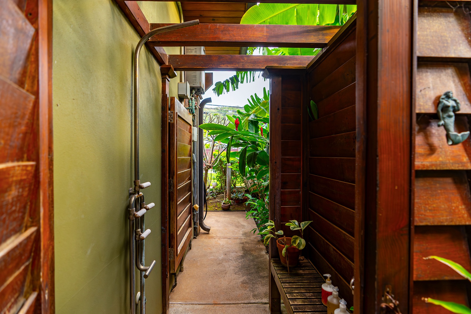 Haleiwa Vacation Rentals, Samurai House - Secluded outdoor shower surrounded by greenery for a refreshing experience.