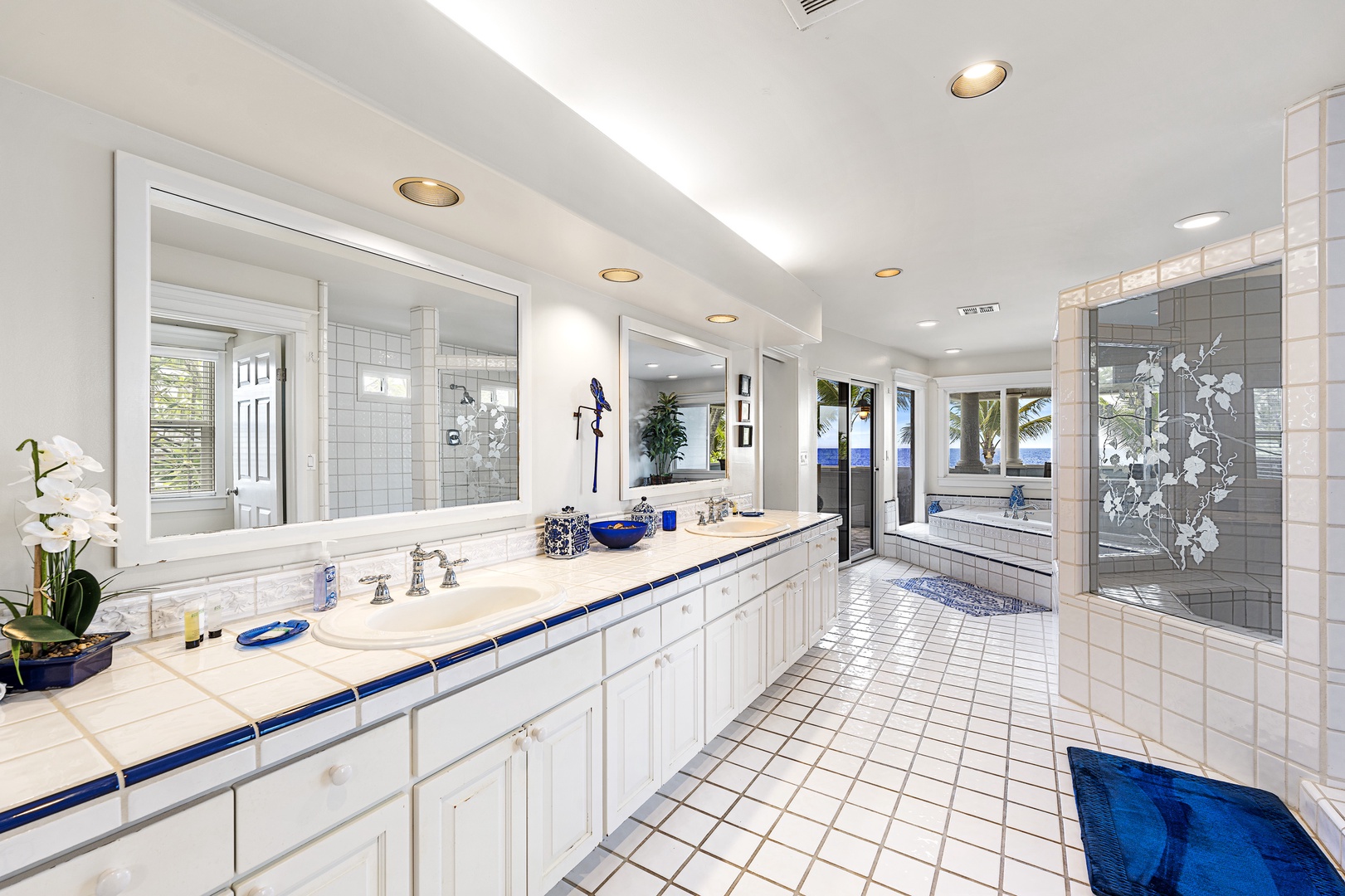 Kailua Kona Vacation Rentals, Kona Blue - Primary Bathroom equipped with dual vanities, walk in shower and oversized soaking tub
